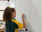 Student working confidently